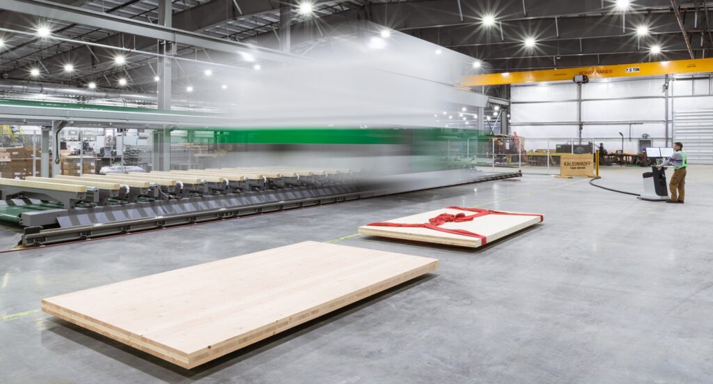 Kalesnikoff mass timber facility showing CNC machine and glulam panels (GLT) made of cross laminated timber