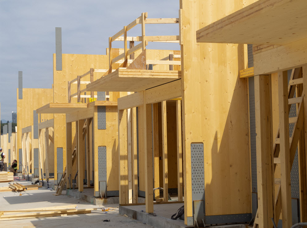 This is a 77-unit mass timber mid-rise housing project.