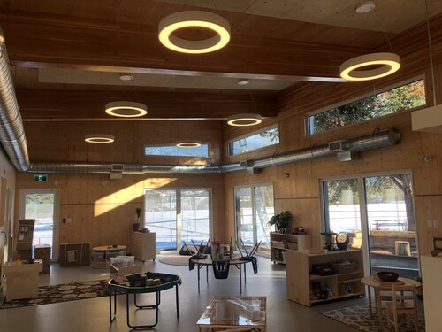 Exposed Spruce CLT (cross laminated timber) makes up the walls and ceilings at this centre, which showcases mass timber inside and out.