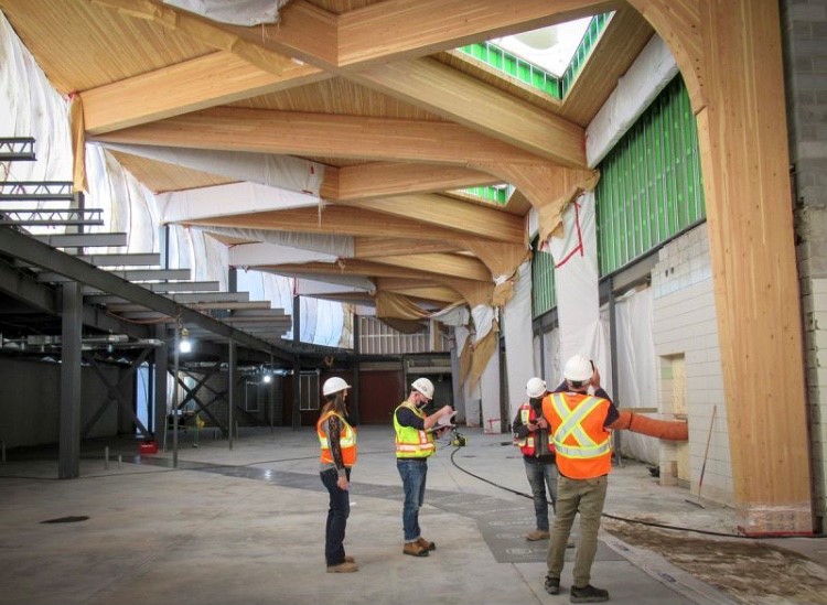 Glulam beams are installed at Olds College